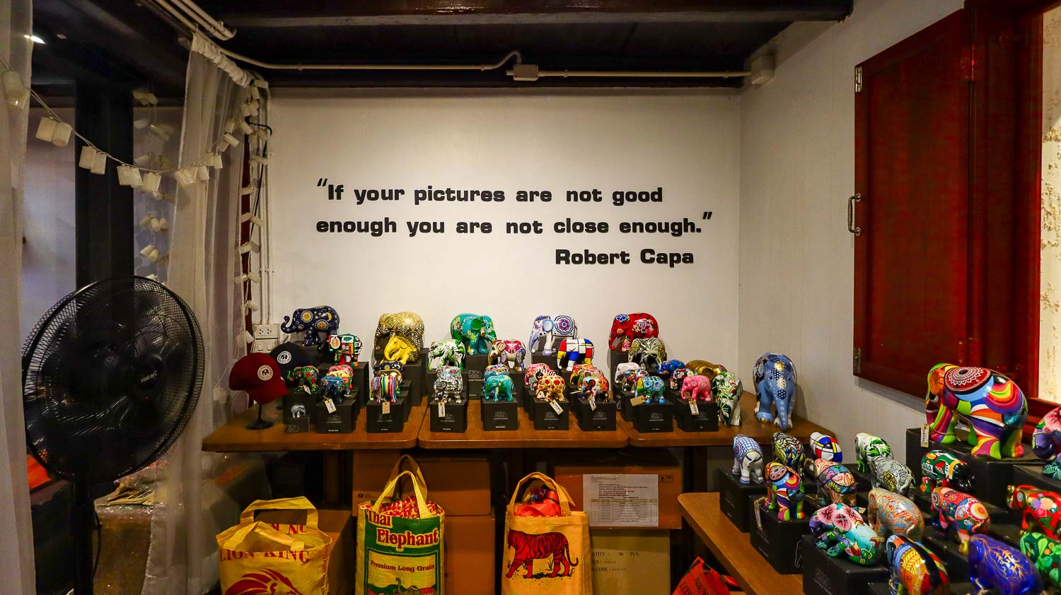 Inside Photohostel and cafe in Talat Noi%20Bangkok If your pictures are not good enough you are not close enough - Sign inside Photohotel Talat Noi