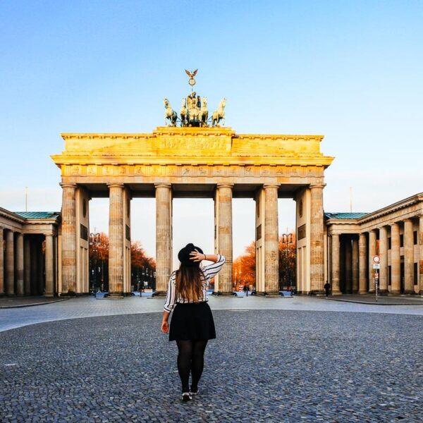 Most instagrammable places in Berlin - Bimba walking towrods Branderbourg Gare