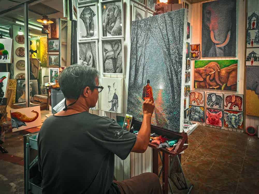 Chiang Mai painter at a night market