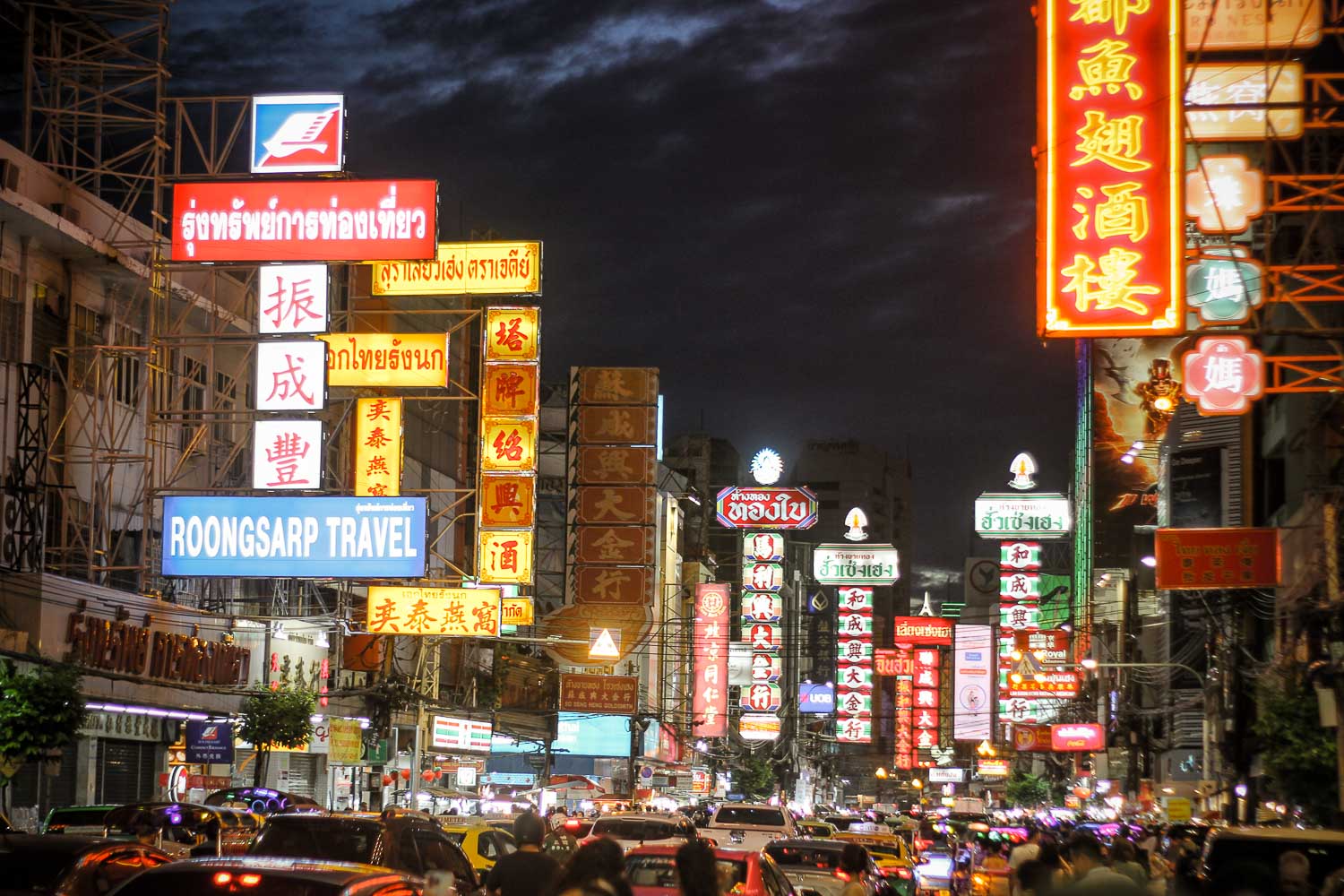 Popular China Town main street with neons and lights China town at night is one of the best places to explore in Bangkok. We were there a couple of times in our trip, and always enjoyed street food, lively atmosphere