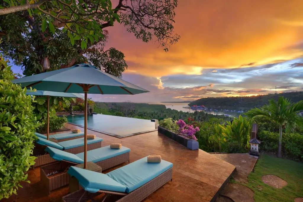 The sunset from the deck of the infinity pool space at Acaia Sedana in Nusa Lembongan