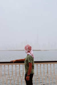 Toti admiring the view from Dubai Creek Harbous | What to wear in Dubai