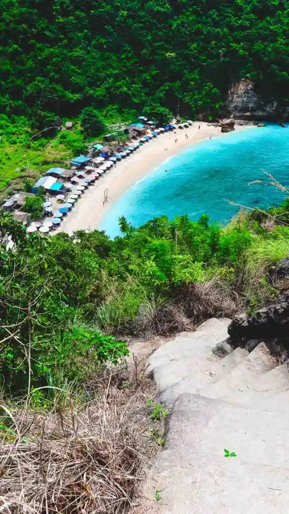 The beautiful view of Atuh Beach and its crystal blue water