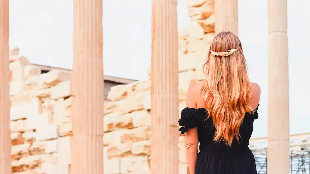 Athens Acropolis best photospots - The Blonde Flamingo posing for Passport and Stamps