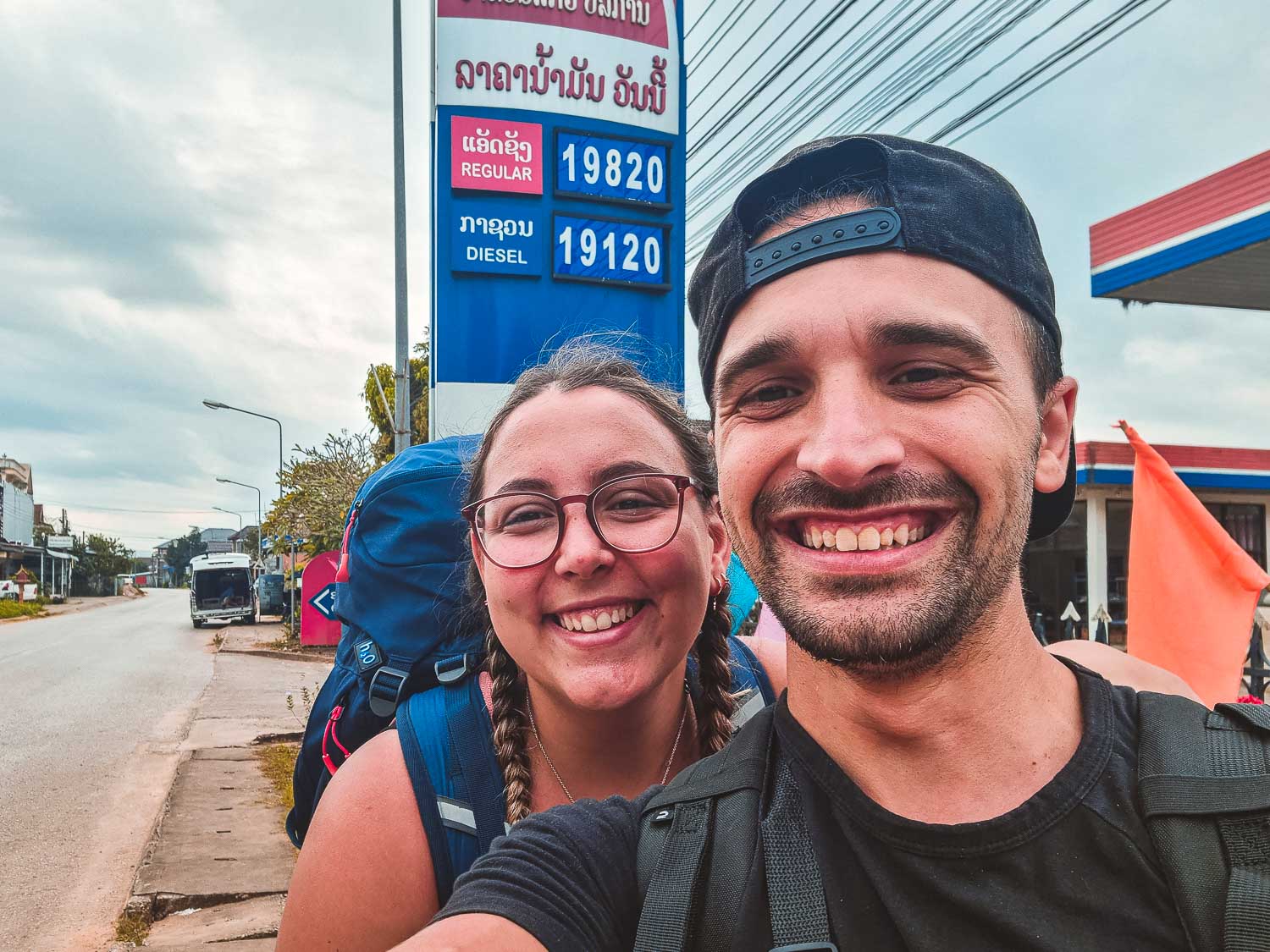 Toti and Ale from Passport and Stamps crossing the Thailand to Laos land border on the banana pancake trail