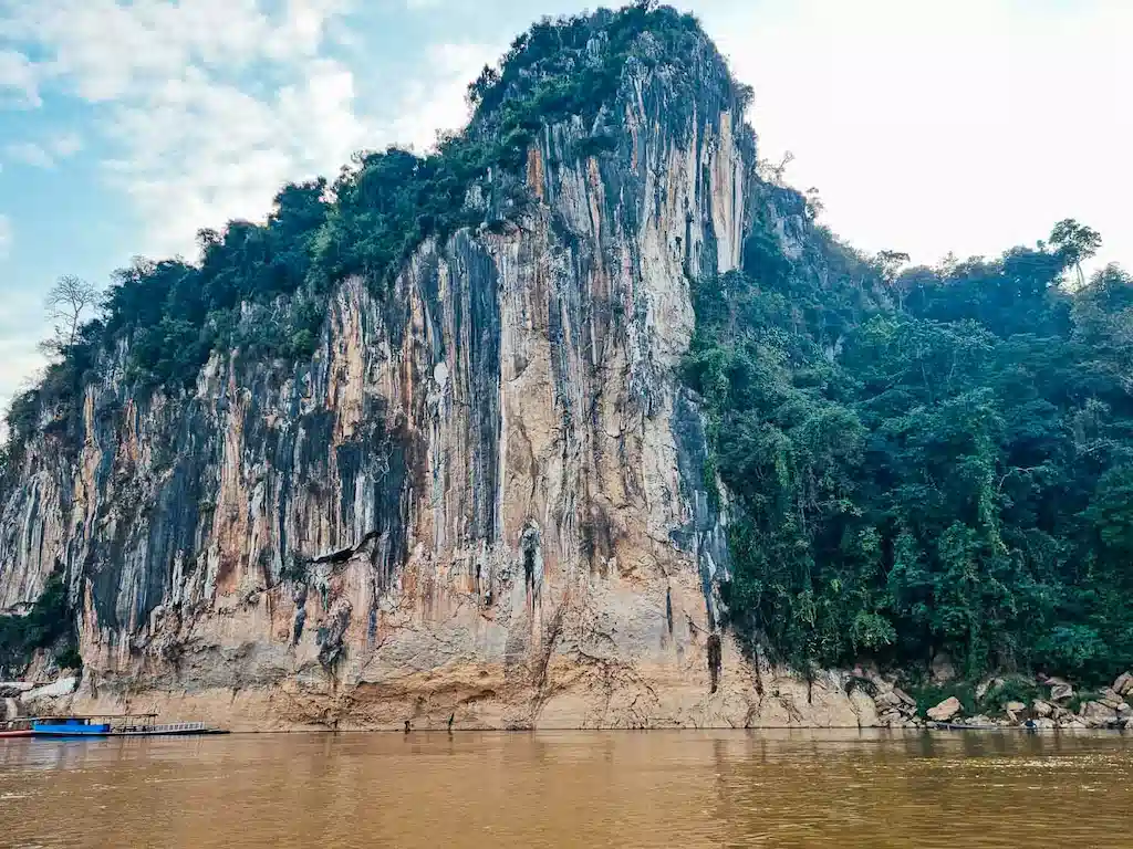 Karst in Laos on the Mekong River Limestone karsts rising from the Mekong River in Laos, seen from our slow boat to Luang Prabang