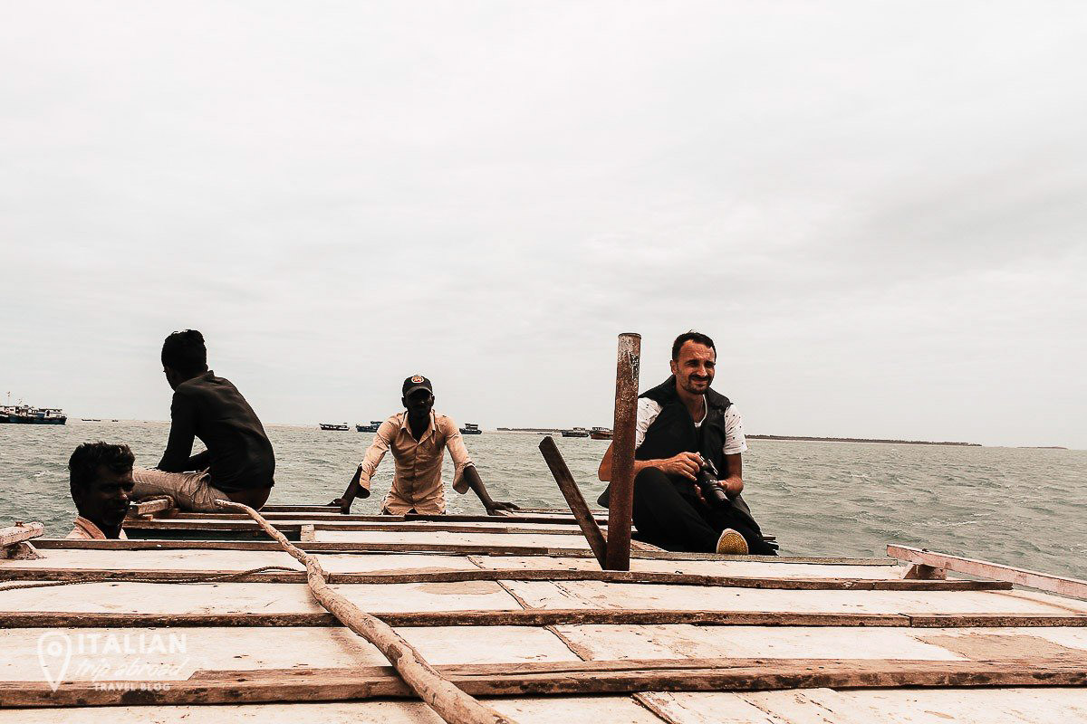 On a narrow wooden boat off the ocean on inhabited islands in the north of Sri Lanka