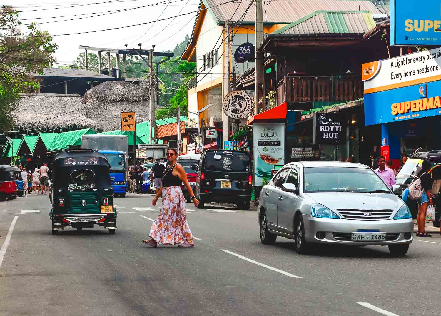 Bimba crossing the streets in Ella Ale of passportandstamps.com - Crossing the streets of Ella town in Sri Lanka highlands