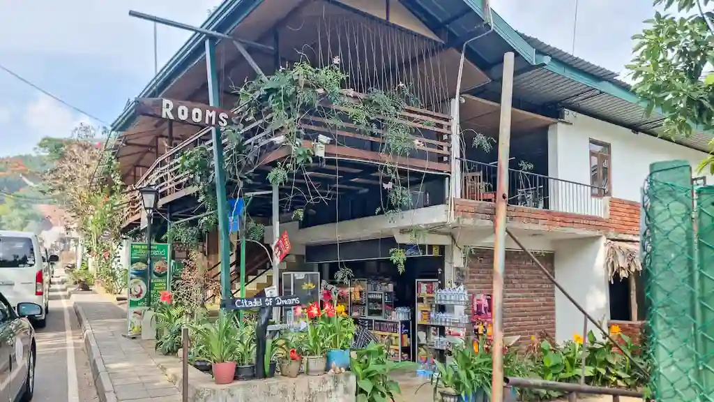 Ella is the perfect hot spot for slowmads you can go hiking, chase waterfalls and have work done at cute cafes - Traditional guest house in Ella town with a balcony view of the mountain gap and tropical greenery.