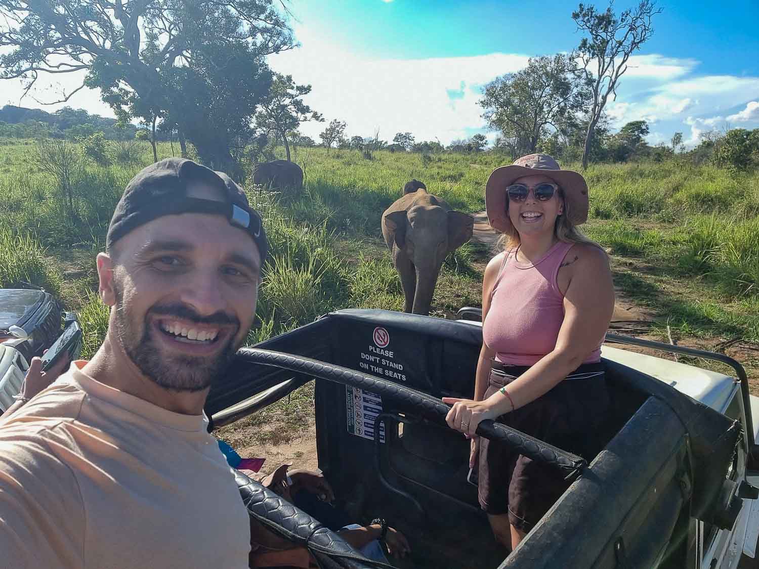 Toti and Ale selfie with elephants in Sri Lanka Elephant encounter at a wild safari in Sri Lanka