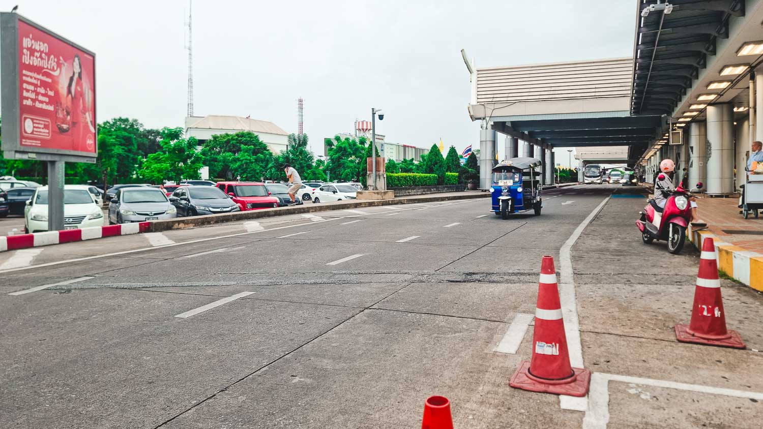 A tuk-tuk waiting outside Chiang Mai Airport to take travellers into the city centre