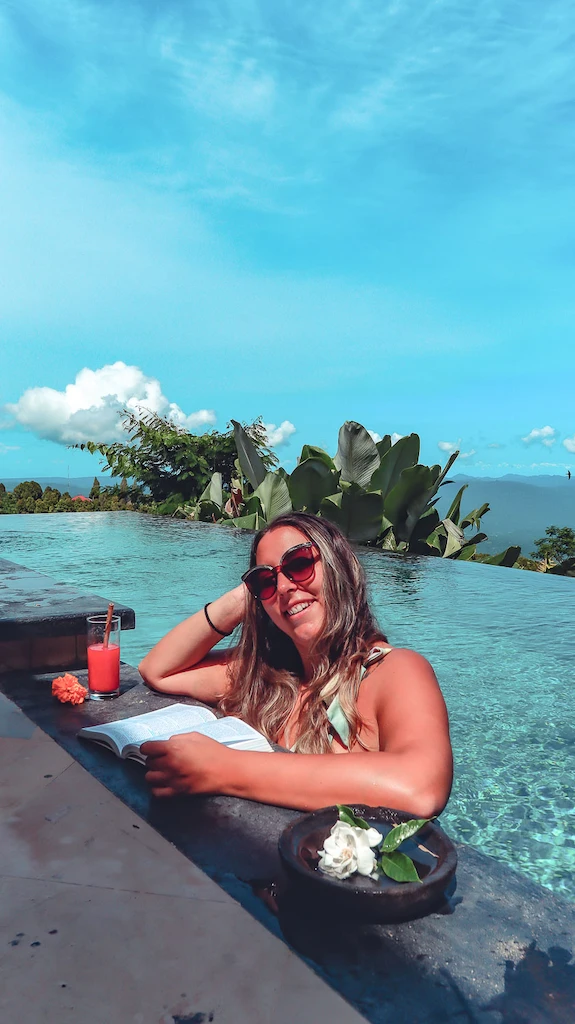 Where to stay in Munduk - Munduk Moding Plantation resort - Bimba enjoying the pool view