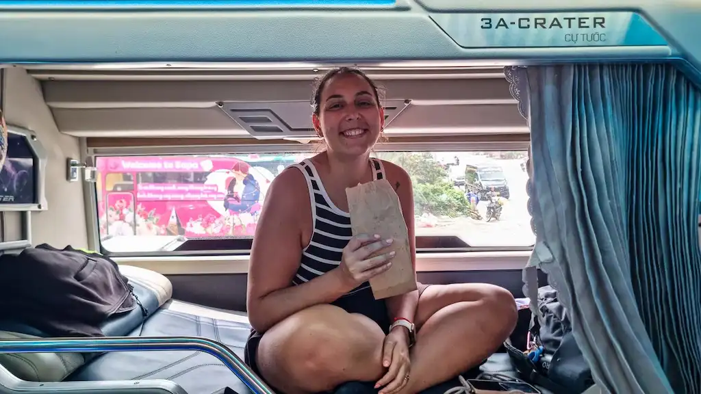 Bimba eating on the bus on our way to Hanoi Remember to bring you own snacks on the return bus to Hanoi