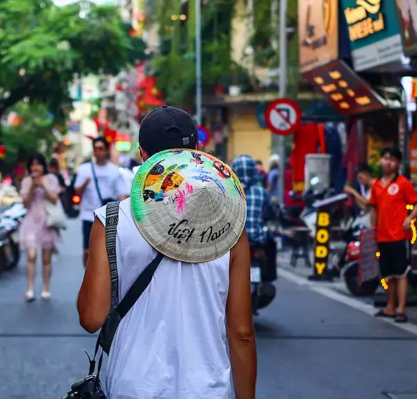 Toti walking around the streets of Hanoi - One month in Vietnam itinerary
