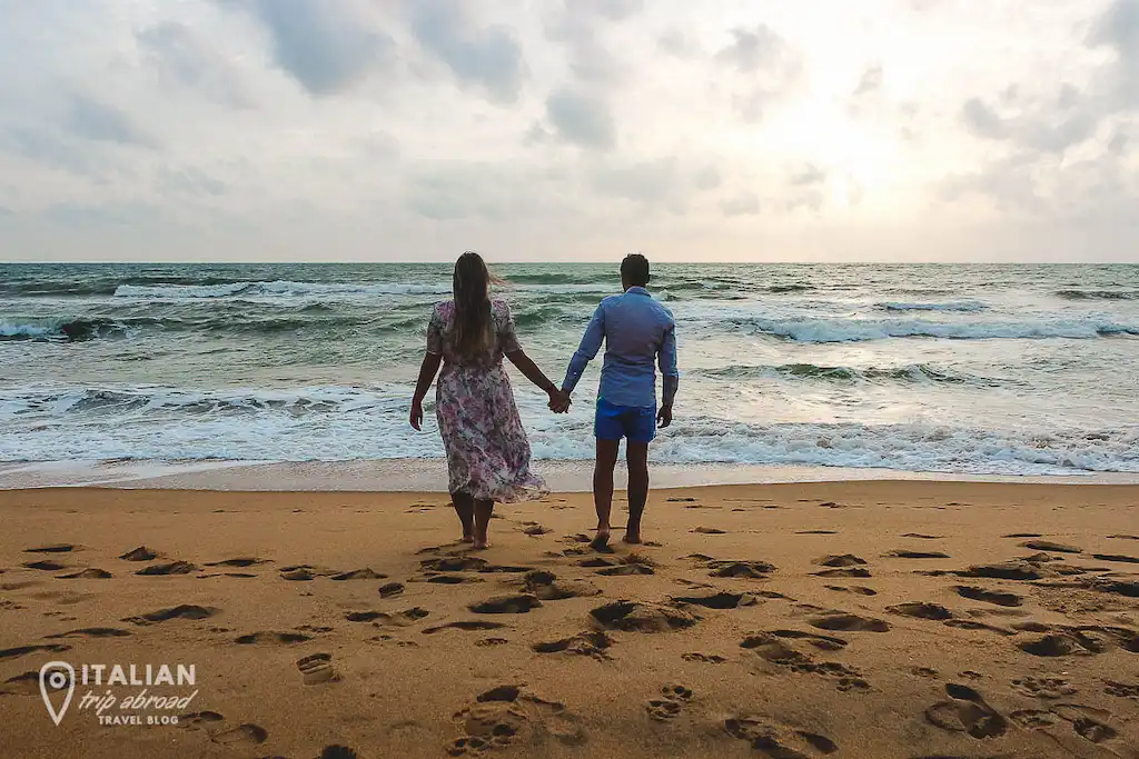 couple walking on the beach Negombo Toti and Ale walking along the beach in Negombo