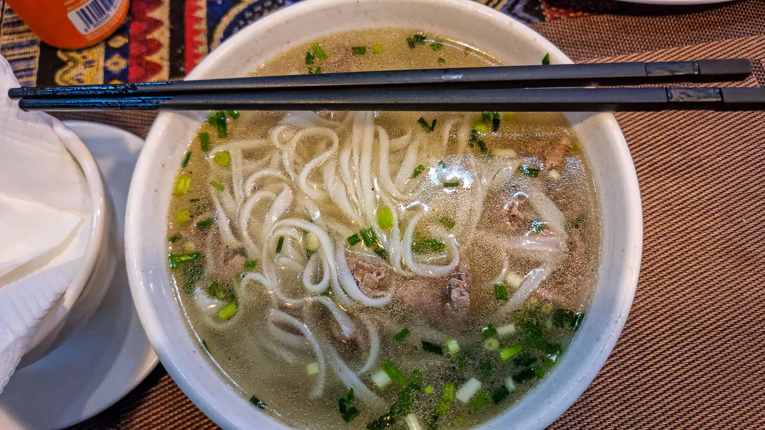 Trying the delicious Pho in Hanoi Vietnam - Hanoi 3-day itinerary