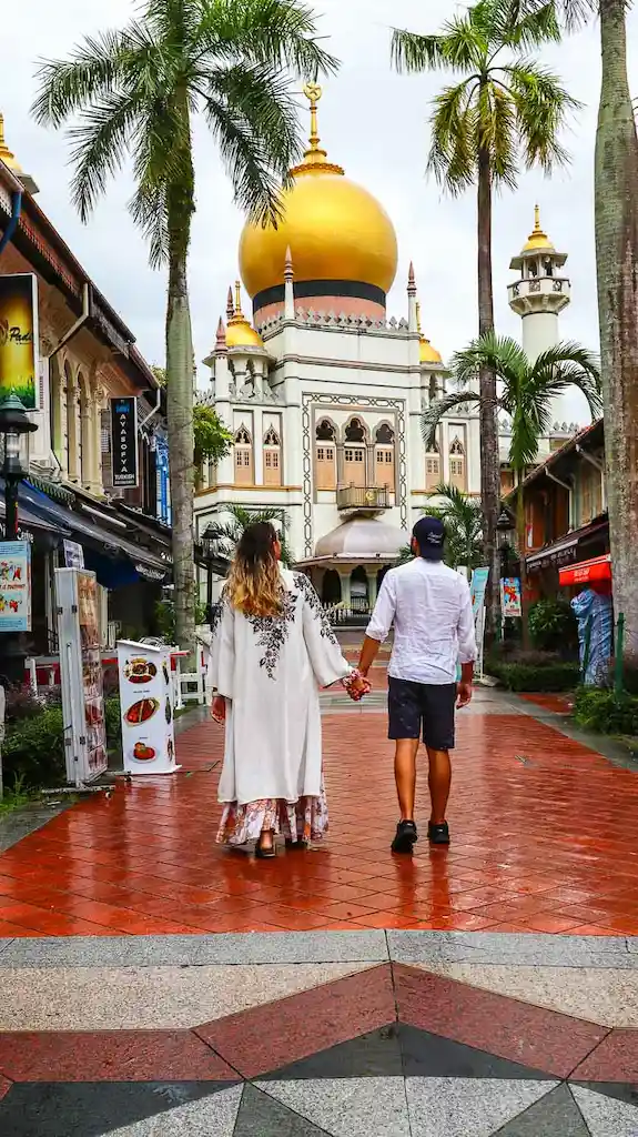 Walking on the pedestrian beautiful road that leads to MAsjid Malabar Mosque