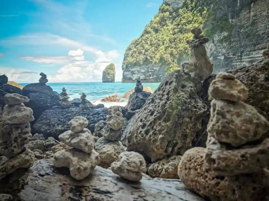 The secret beach at Tembeling forest is often hidden as the sea waves crashes on the cliff