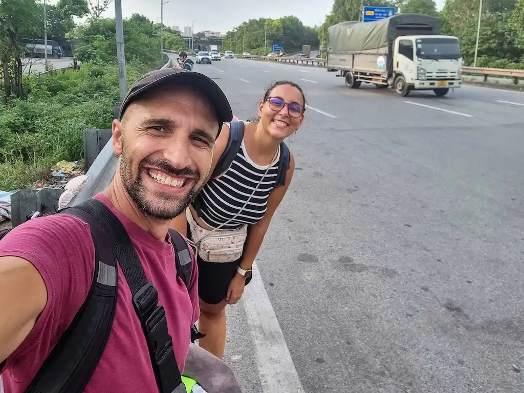 We were stranded on a busy highway outside of Hanoi waiting for our sleeper bus to showup