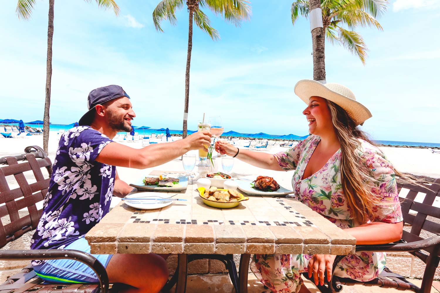 A couple enjoying a relaxing retreat in Barbados Caribbean Island Hilton Resort Bridgetown Barbados Experiences for couples - how to spend one week in Barbados