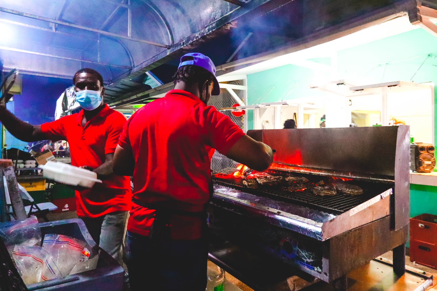 Oistins fish fry market chefs cooking perfect fish Oistins fish fry market chefs cooking perfect fish