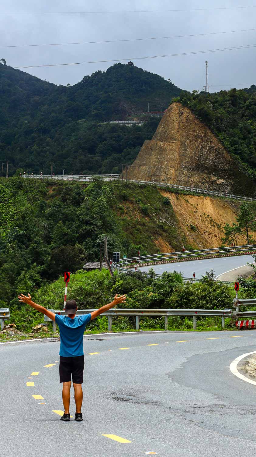 On an empty road through the mountains of North Vietnam on the way to the silver waterfall