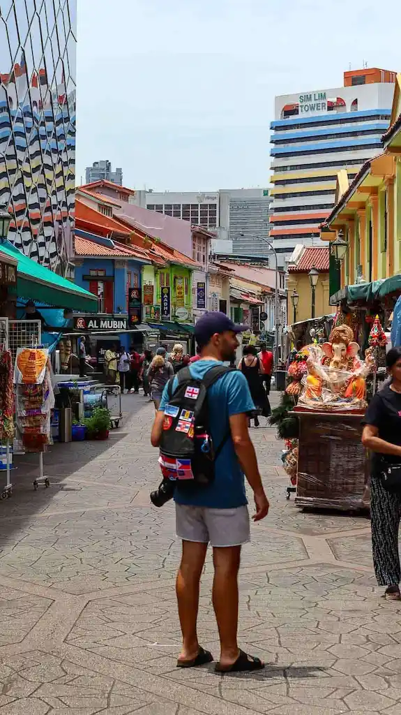 Toti walking around the market in Little India in Singapore