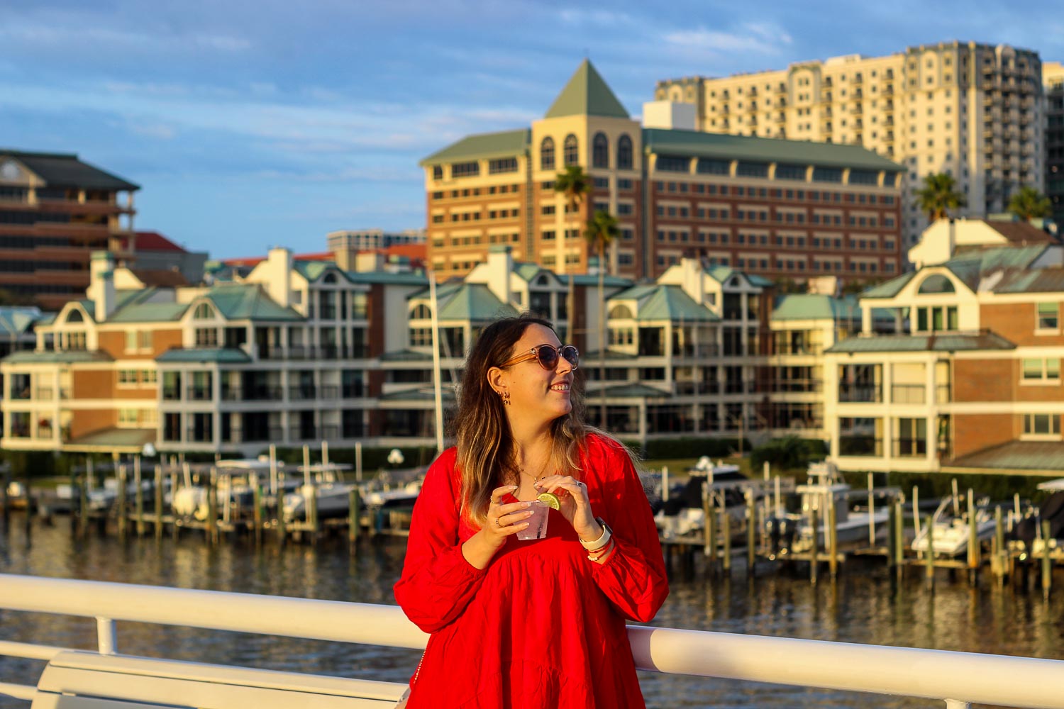 Bimba enjoying a drink along the luxury cruise in Tampa Bay