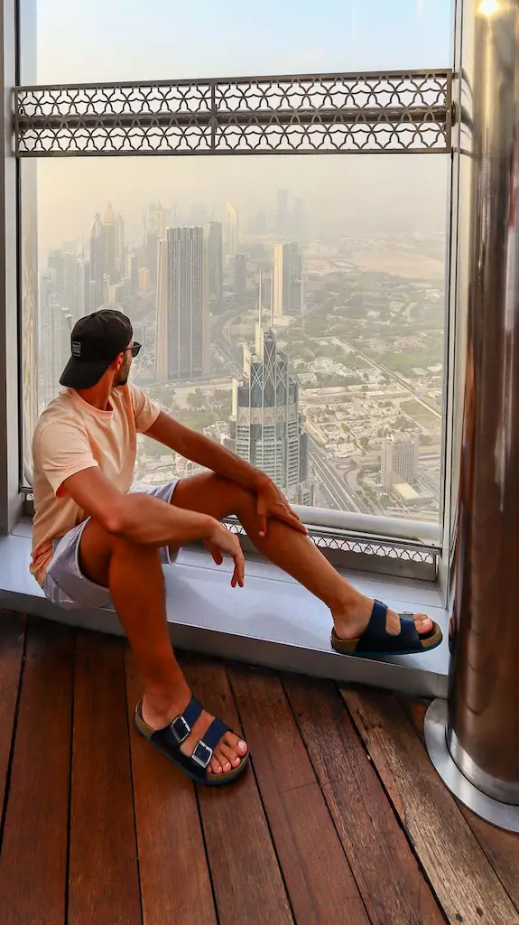 Toti admiring the gorgeous view from the Burj Khalifa Toti admiring the gorgeous view from the Burj Khalifa