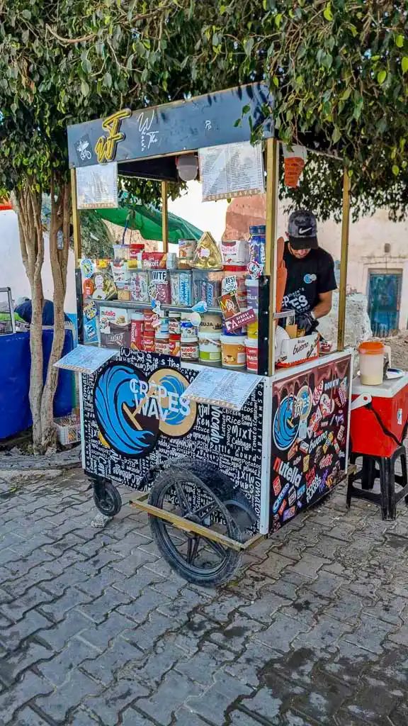 Crepes and waves Taghazout shop cart Taghazout local vendor along the street