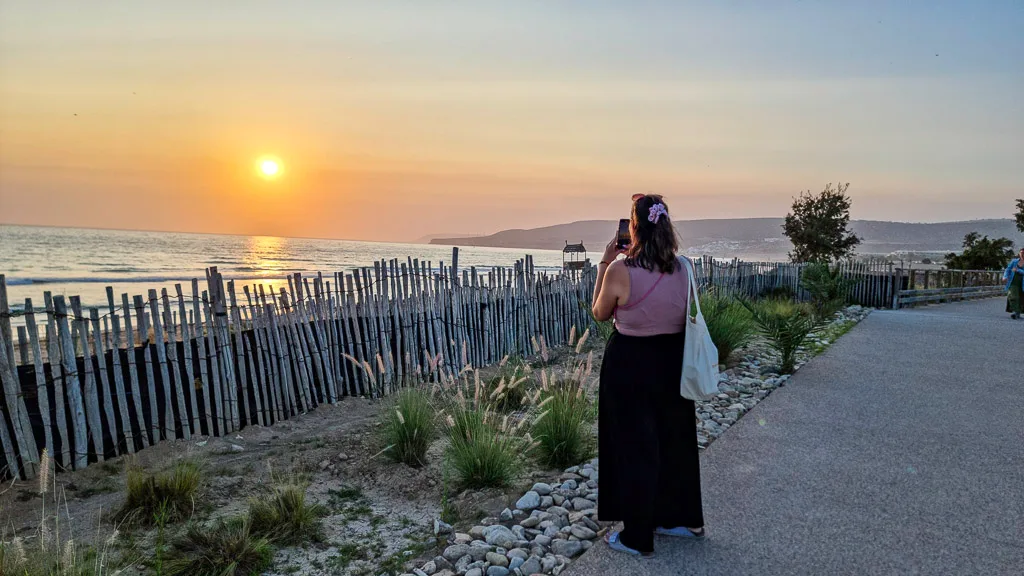 Enjoying the beautiful sunset from the boardwalk from Tamraght to Taghazout