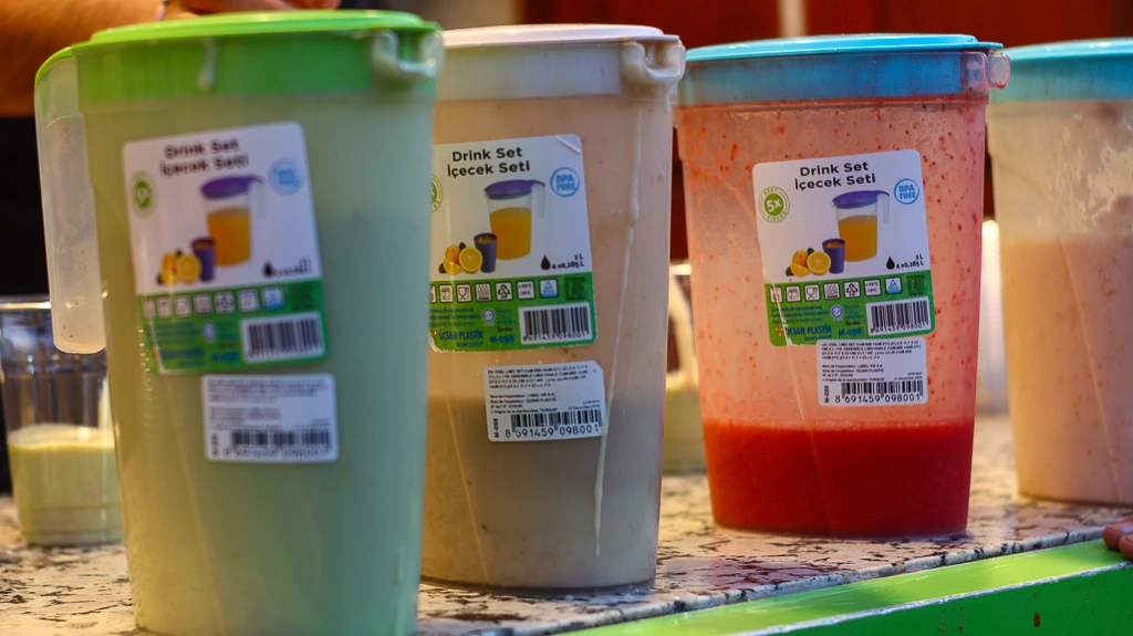 Jugs of Panache smoothie at the famous Smoothie shop next to the meat shops along Derb Debachi Marrakech