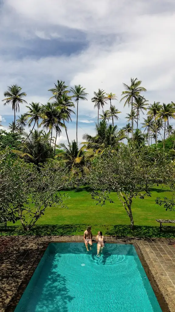 Couple enjoying pool in Bentota Bentota boutique hotel - The Rock Villa Toti and Ale enjoying the pool view