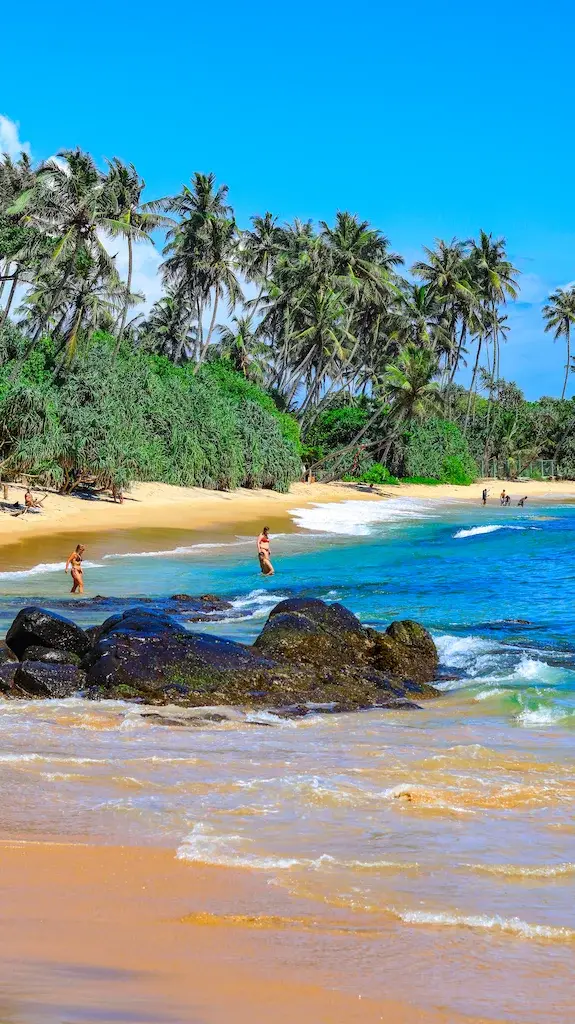 Hirikeiya beach swimming in the beautiful and crystal blue water
