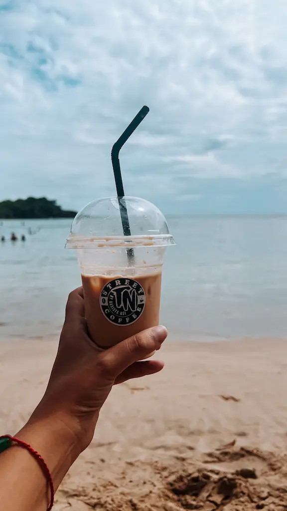We took our Latte on the beach - Grabbing an iced latte from TNT coffee cat was epic and right on the sandy shore of Hiriketiya