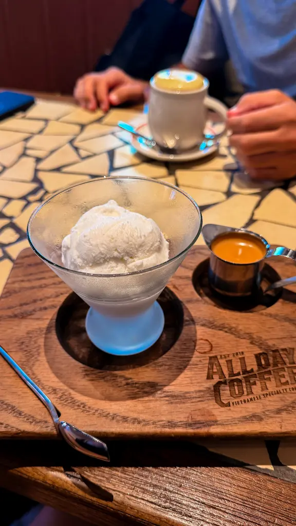 Trying the coconut affogato from All Day coffee in Hanoi