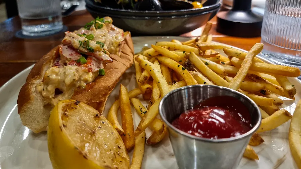 Eating the best lobster roll at Anchor and Brine along Tampa riverwalk