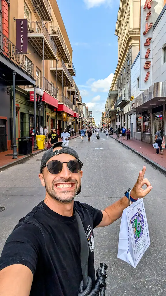 Toti taking a selfie on the busy road of Bourbon Street