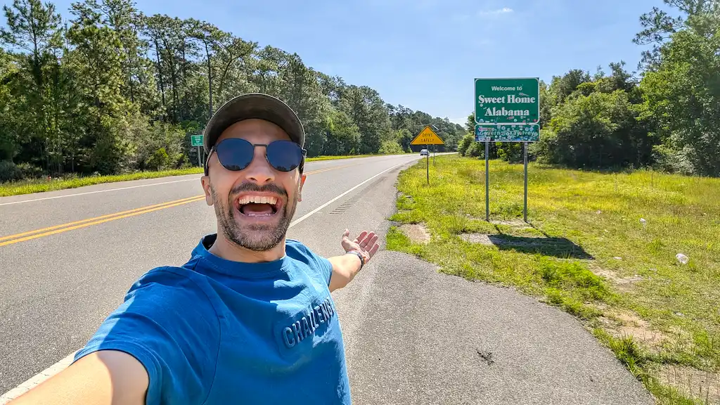 Home sweet home Alabama sign - Toti taking a selfie from the road 